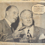 Vintage newspaper page featuring two men with a speech bubble labeled 'Amos n' Andy'.