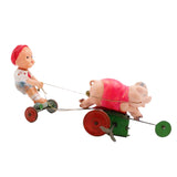 Vintage 1930’s Mechanical Wind-Up Celluloid Boy Chasing Pig