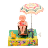 Japan Wind-Up Litho Lady On The Beach With Umbrella and Duck