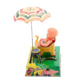 Japan Wind-Up Litho Lady On The Beach With Umbrella and Duck