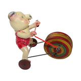 Three Vintage Celluloid Tin Wind-Up Pigs Riding on Tricycle