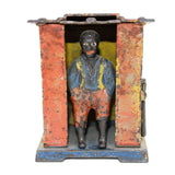 1885 J. & E. Stevens Mechanical Bank- Black Man In Yellow Cabin