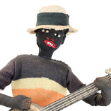 8" Tall Cloth Doll of a Banjo Playing Man Sitting on a Bale of Cotton