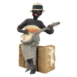 8" Tall Cloth Doll of a Banjo Playing Man Sitting on a Bale of Cotton