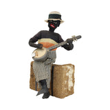 8" Tall Cloth Doll of a Banjo Playing Man Sitting on a Bale of Cotton