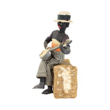 8" Tall Cloth Doll of a Banjo Playing Man Sitting on a Bale of Cotton