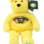 Yellow teddy bear with a colorful design on its chest against a white background