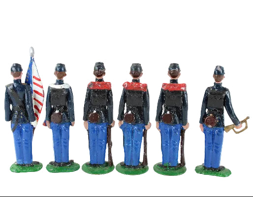 Set of six toy figures in union civil war uniforms with an American flag on a white background