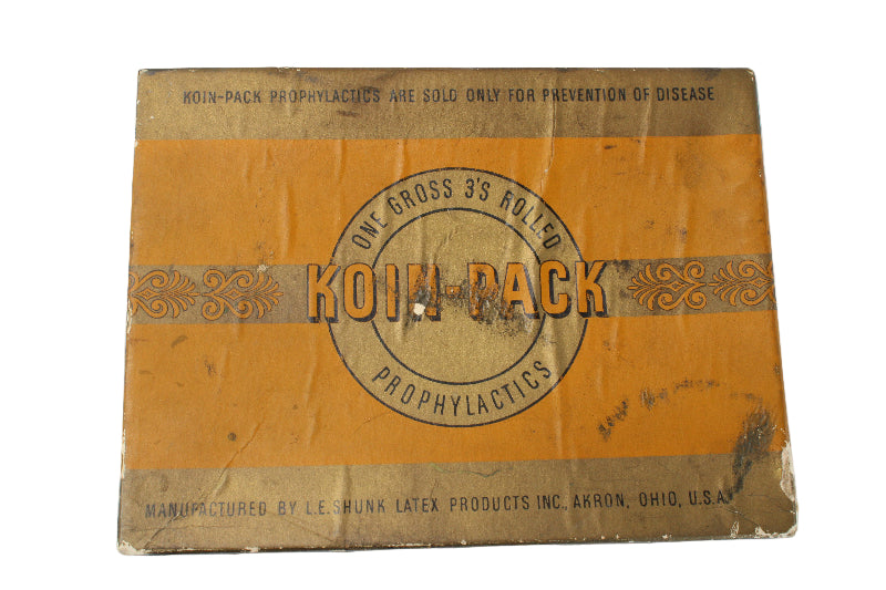 Vintage Koin-Pack box with text on a white background