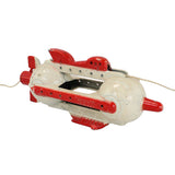 Toy airplane with red accents on a white background