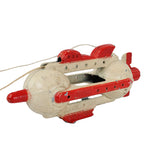 Toy submarine with red accents on a white background