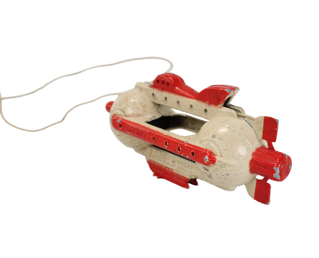 Toy boat with red accents on a white background