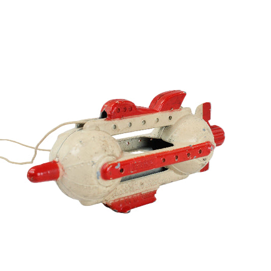 Toy airplane with red accents on a white background