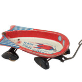 Vintage toy blimp with 'Flash Strat-O-Matic' branding on a white background