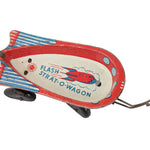Vintage toy Flash Strat-O-Wagon on a white background