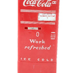 Red Coca-Cola cooler with text on a white background