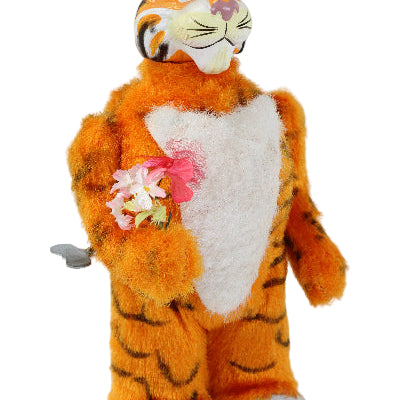 Plush tiger toy with a white chest on a light gray background