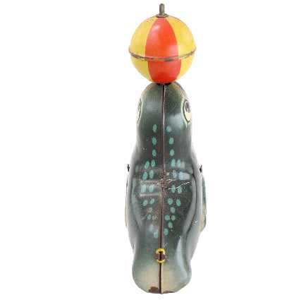 Vintage-style fishing lure with a detailed body and colorful bobber on a white background