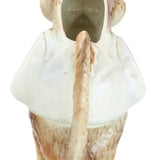 Decorative vase shaped like a person with a green interior on a white background