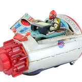 Toy space vehicle with a figure inside on a white background