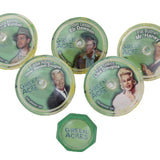 Set of 'Green Acres' themed buttons with character portraits on a white background