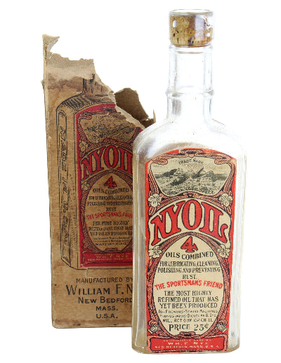 Vintage bottle with a torn label on a white background