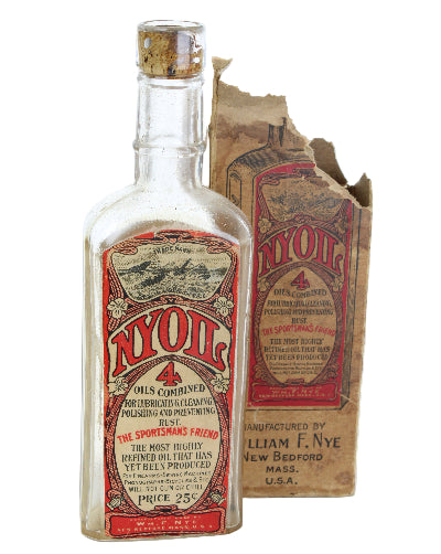 Vintage Wills bottle with a crumpled label on a white background