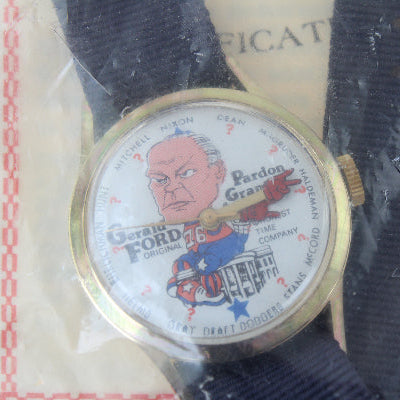 Watch with a political figure on the face, still in packaging