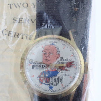 Watch with a portrait on the face, wrapped in clear plastic with text, on a white background