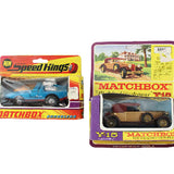 Two vintage Matchbox toy cars in their original packaging on a white background