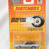 Matchbox Mercedes-Benz toy car on a yellow packaging with branding.
