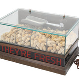 Display case with peanuts and 'They're Fresh' sign on a white background