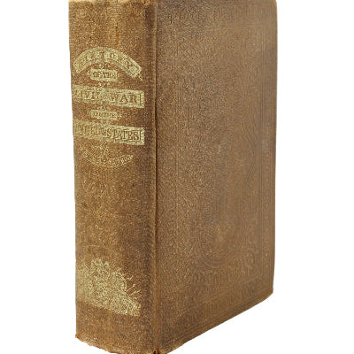 Vintage book with decorative spine on a white background