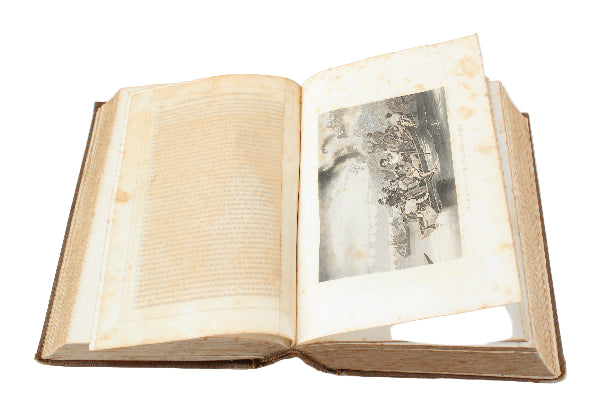 Open book with a black and white photograph inside on a white background