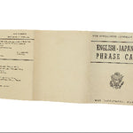 Folded paper with text and a logo on a white background