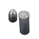 Two silver bullets on a dark background