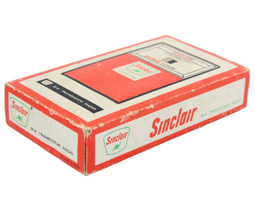Sinclair transistor radio packaging on a white background