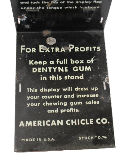 Dentyne Gum display stand with promotional text on a white background