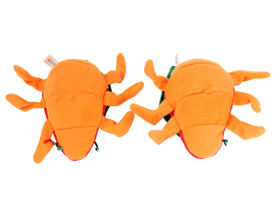 Two orange plush bugs on a white background
