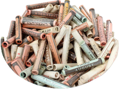 Jar filled with rolled-up paper tubes with text on a light background