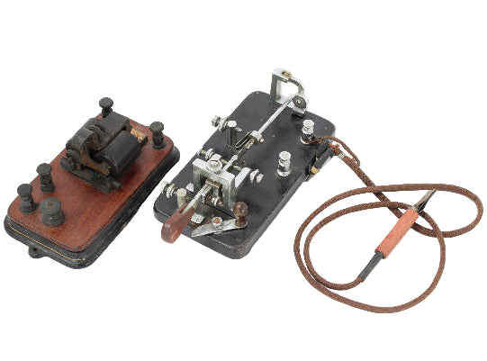 Vintage telegraph machine on a white background