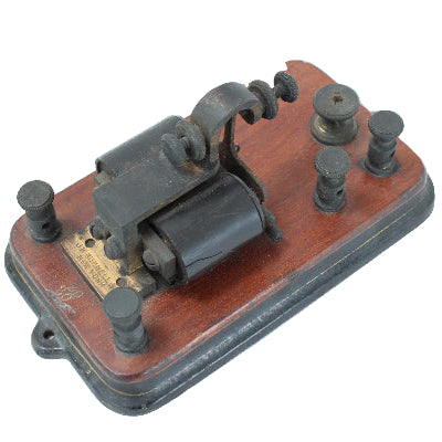 Vintage telegraph key on a white background