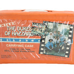 Orange carrying case for ERTL The Dukes of Hazzard toy cars on a white background