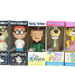 Set of five Wacky Wobbler figurines in their packaging on a white background