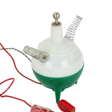Transistor radio setup with a green and white bulb, red and black wires, and metal clips on a white background.