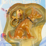 Toy figure of a character with a gold helmet and goggles in packaging on a white background