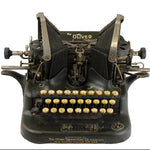 Vintage Oliver typewriter on a white background
