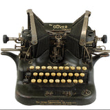 Vintage Oliver typewriter on a white background