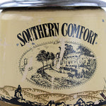 Canister labeled 'Southern Comfort' with black graphics on a beige background