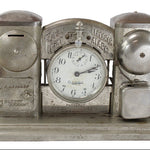 Vintage electric alarm clock with savings bank on a white background
